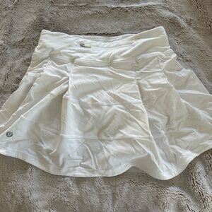 white lulu lemon skirt with built in shorts size 2